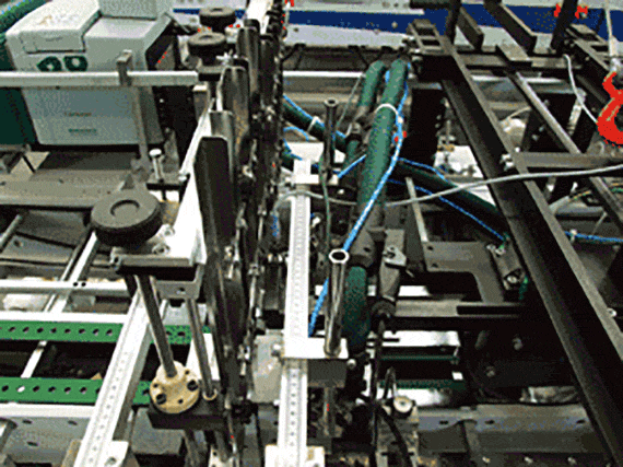 Folding and gluing machine