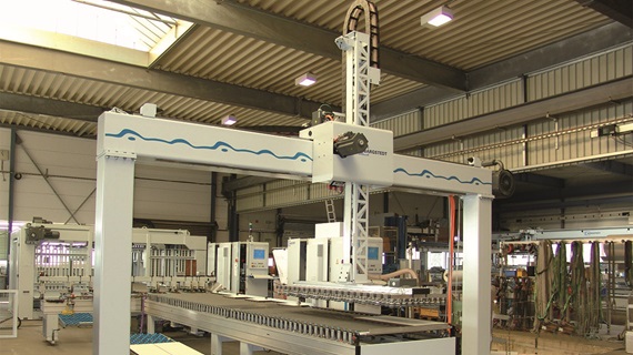 Feeding and stacking system with energy chains