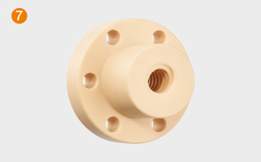 Ecrou à collerette pour vis trapézoïdale drylin