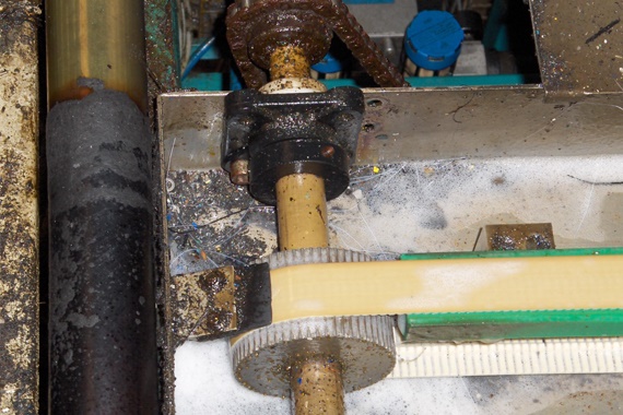 A plain bearing made of bar stock in a tyre fitting line