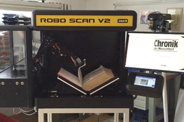 Automated book scanner with robolink D articulated arm